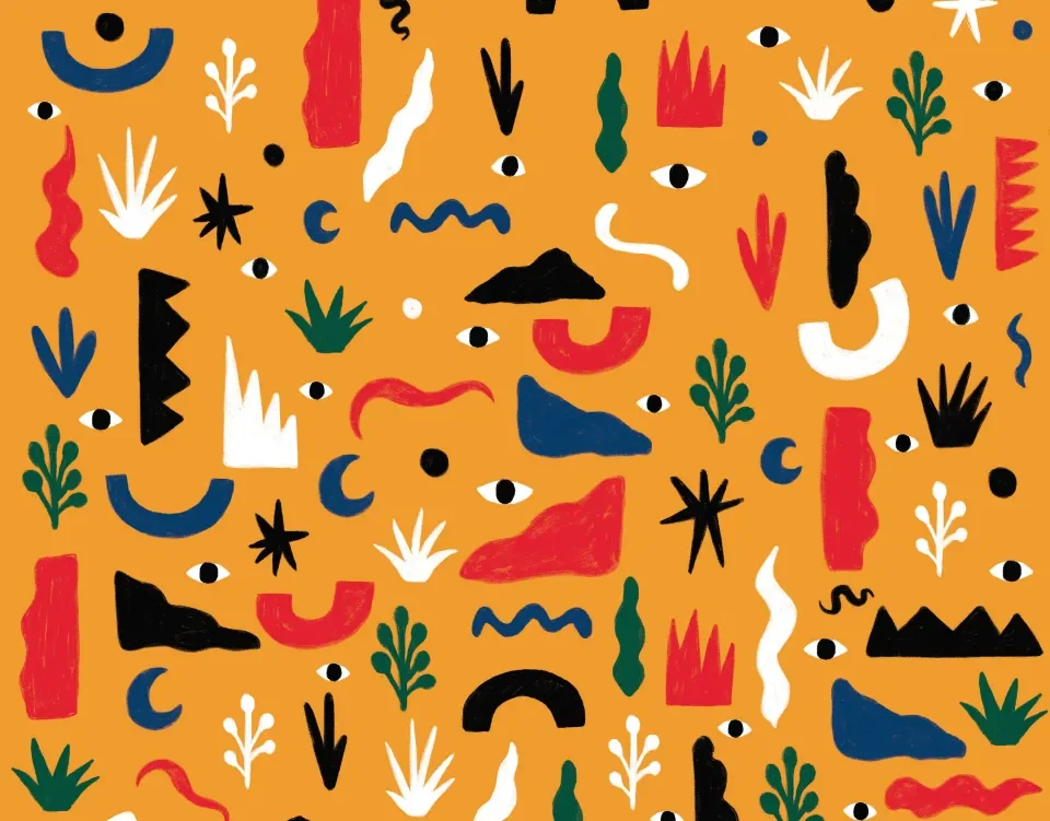 An orange pattern of leaves, stars and small shapes