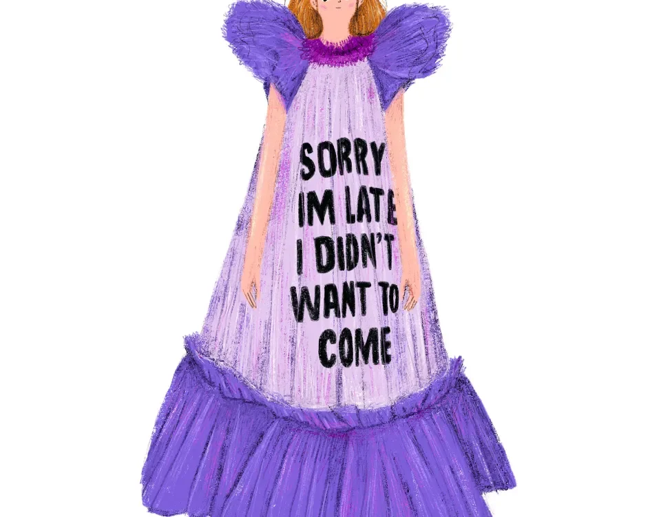 A model in a lilac tulle gown printed with the words Sorry I’m late, I didn’t want to come